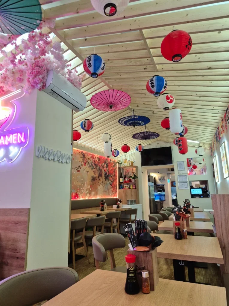 Japanese lanterns and seating inside Hana Ramen